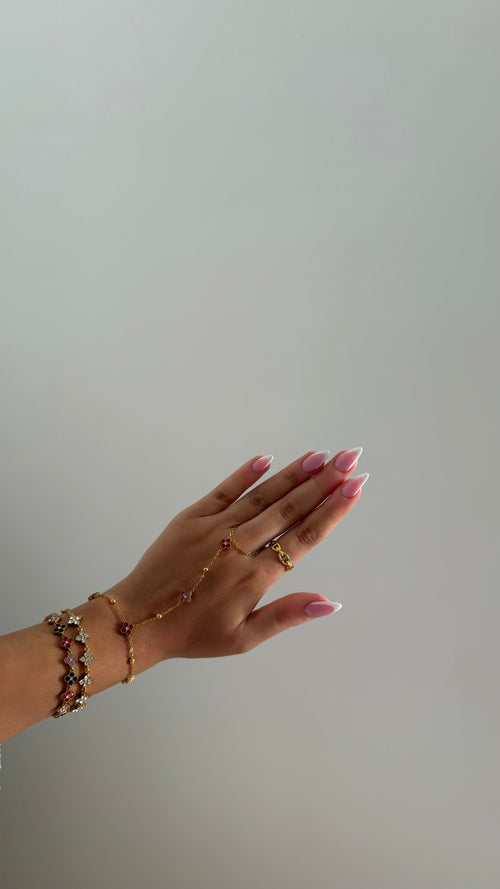 BIJOUX - chaîne de main doré/rose